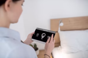 female turning light using remote control 259150 57143